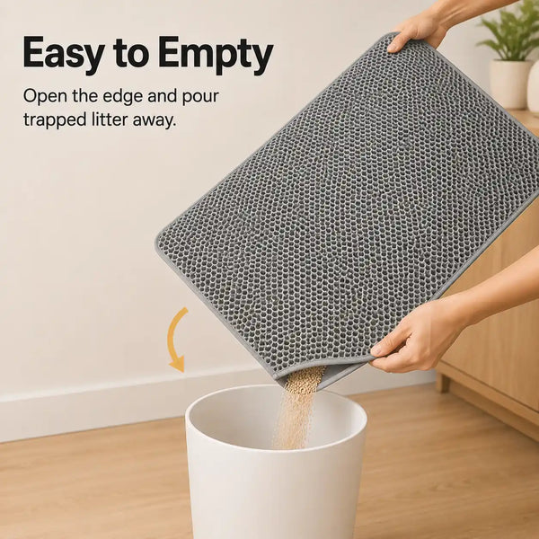 Collected cat litter being emptied from a gray double-layer litter mat