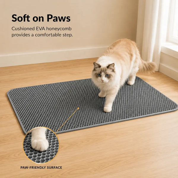 Fluffy cat stepping on a soft gray EVA honeycomb litter mat